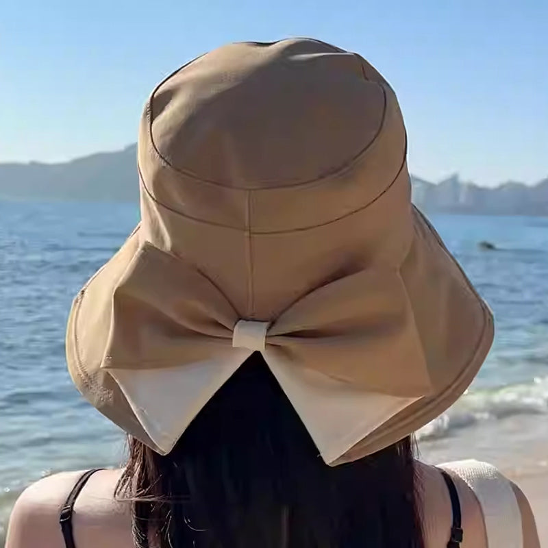 👒 50% OFF NOW ! 💐 Women's Bowknot Wide Brim Sun Protective Hat – Oversized wide brim blocks UV rays, delicate bow decor, lightweight breathable fabric, ideal for beach, travel & outdoor walking✨