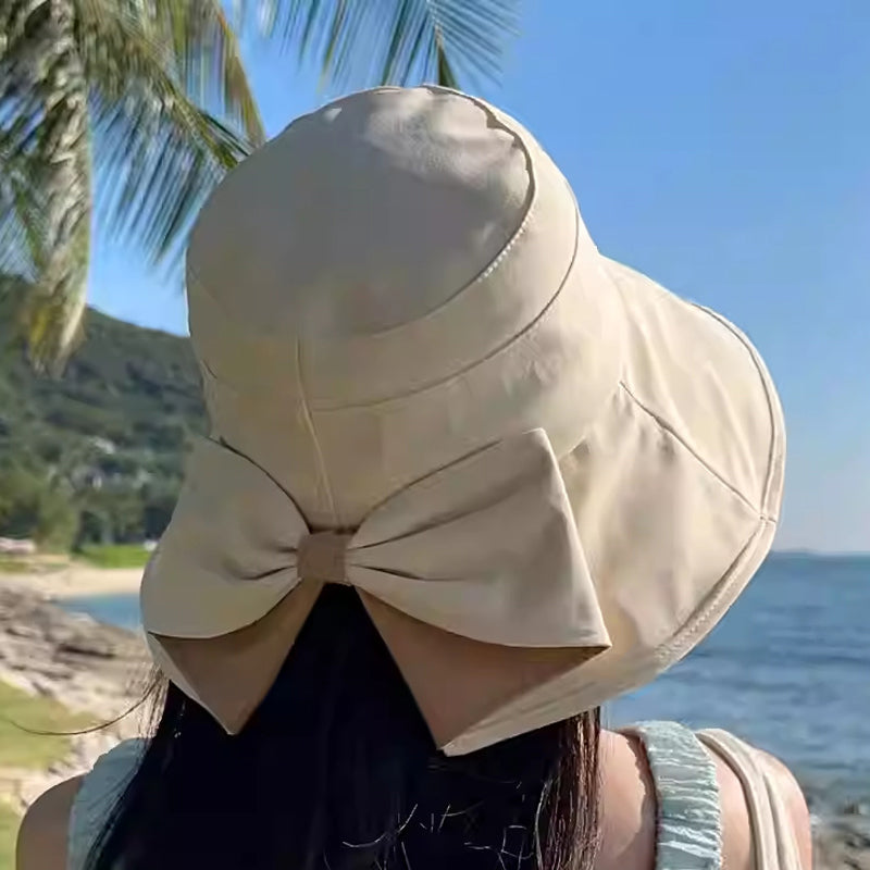 👒 50% OFF NOW ! 💐 Women's Bowknot Wide Brim Sun Protective Hat – Oversized wide brim blocks UV rays, delicate bow decor, lightweight breathable fabric, ideal for beach, travel & outdoor walking✨